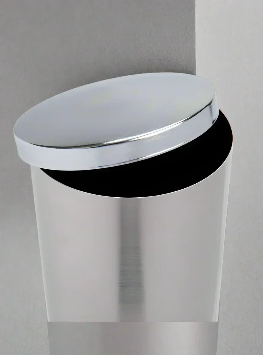 San Jamar stainless steel trash receptacle with open round lid against gray background