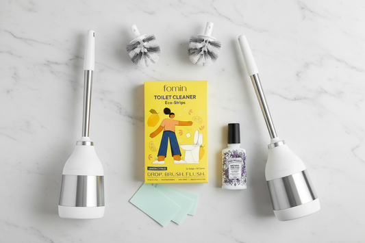 Ultimate bathroom refresh bundle featuring two stainless steel toilet brushes , two full-size spare replacement heads, Fomin eco strips, and Poo-Pourri spray.