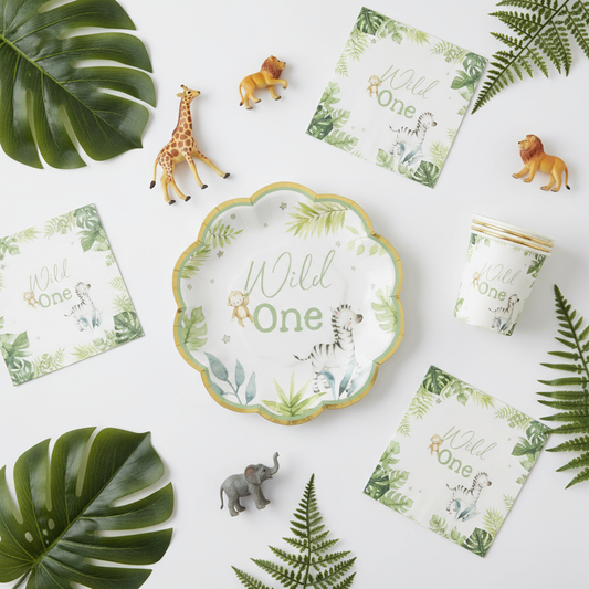 Flat lay of Wild One safari party supplies