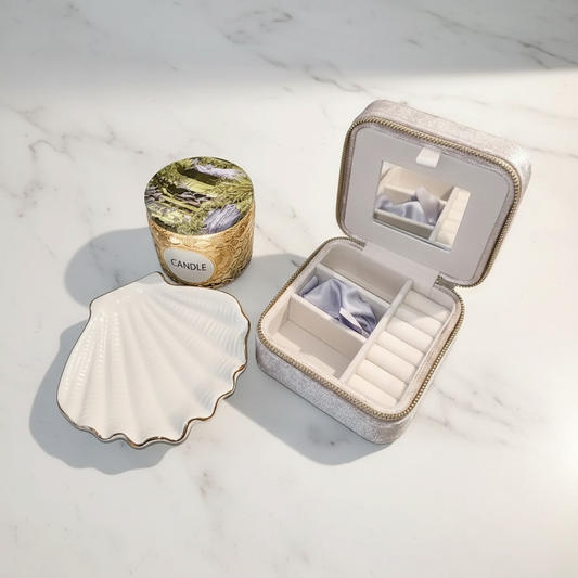 Close-up of the champagne velvet jewelry box with a built-in mirror and versatile compartments, part of a curated luxury gift set.