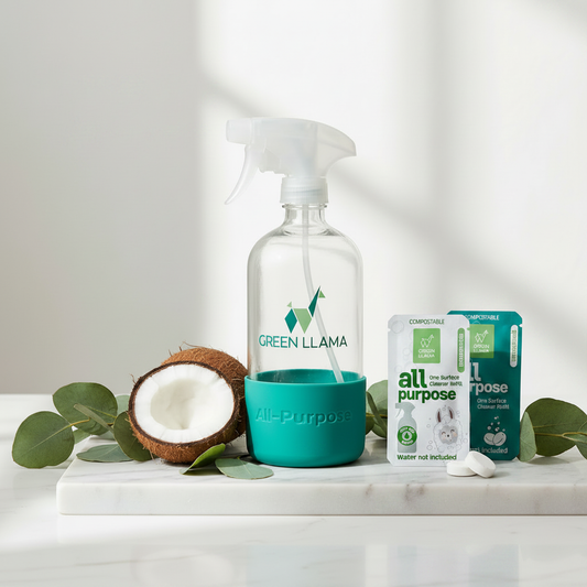 Green Llama glass spray bottle with Lemongrass and Fragrance-Free all-purpose cleaning tablets.