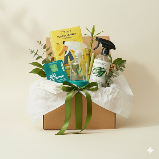 Complete zero-waste bathroom cleaning kit in a shipping box with Koala Eco bathroom cleaner, bamboo cloths, and Green Llama refillable bottles.