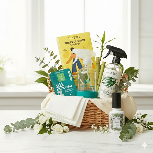 Eco-friendly bathroom cleaners bundle in a woven basket featuring Koala Eco, Green Llama, Fomin strips, and Poo-Pourri spray.