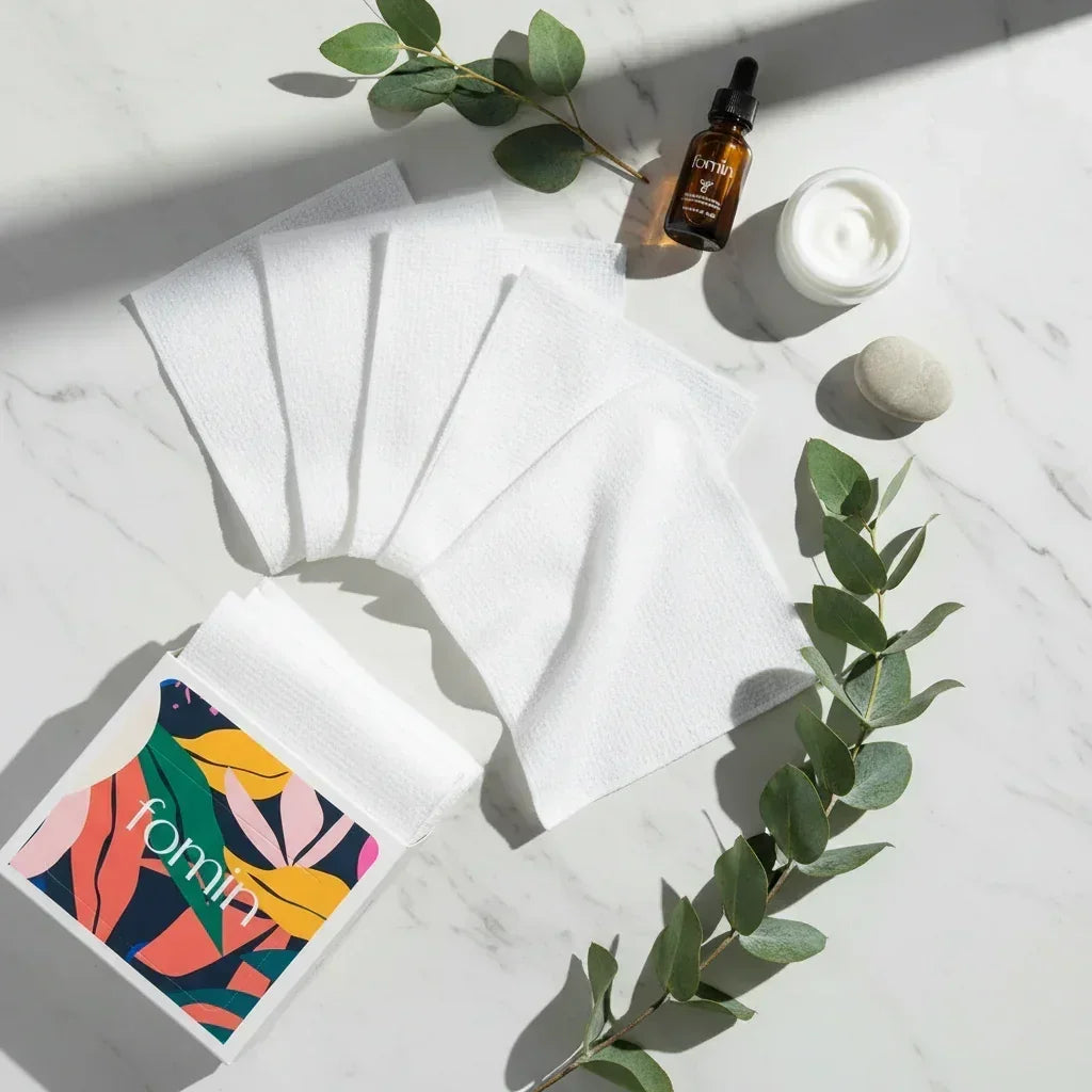 Spa flat lay with towels and natural elements