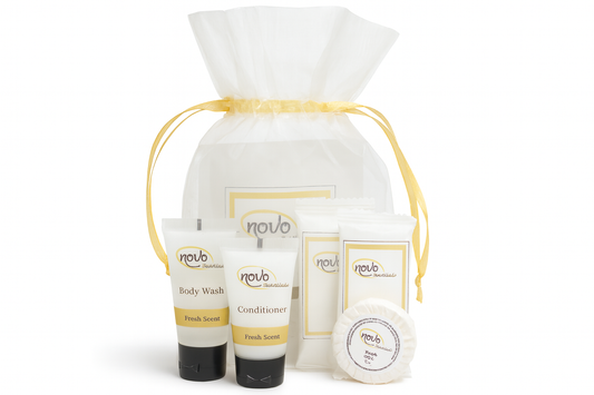Studio product photography of hotel amenity kit with all items visible