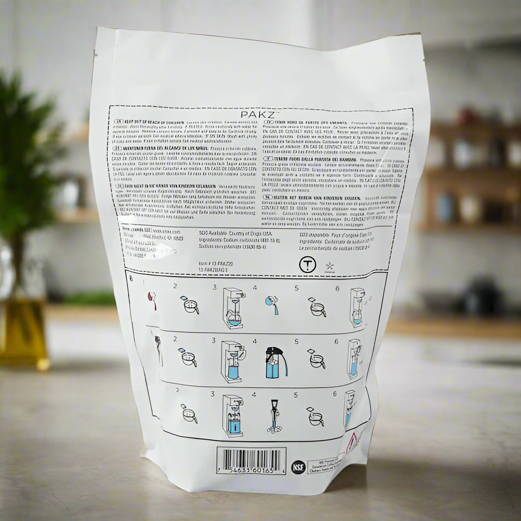 White product packaging with text and icons on a gray background